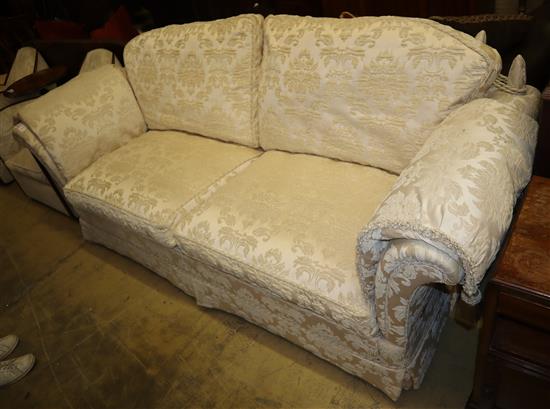 A large modern Knoll style cream silk foliate brocade upholstered two seater settee, W.238cm